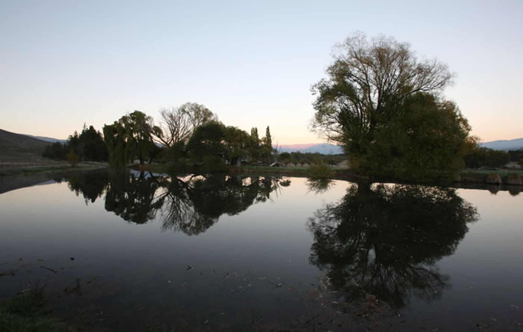 Still High Country water at dusk, ideal for fly-fishing