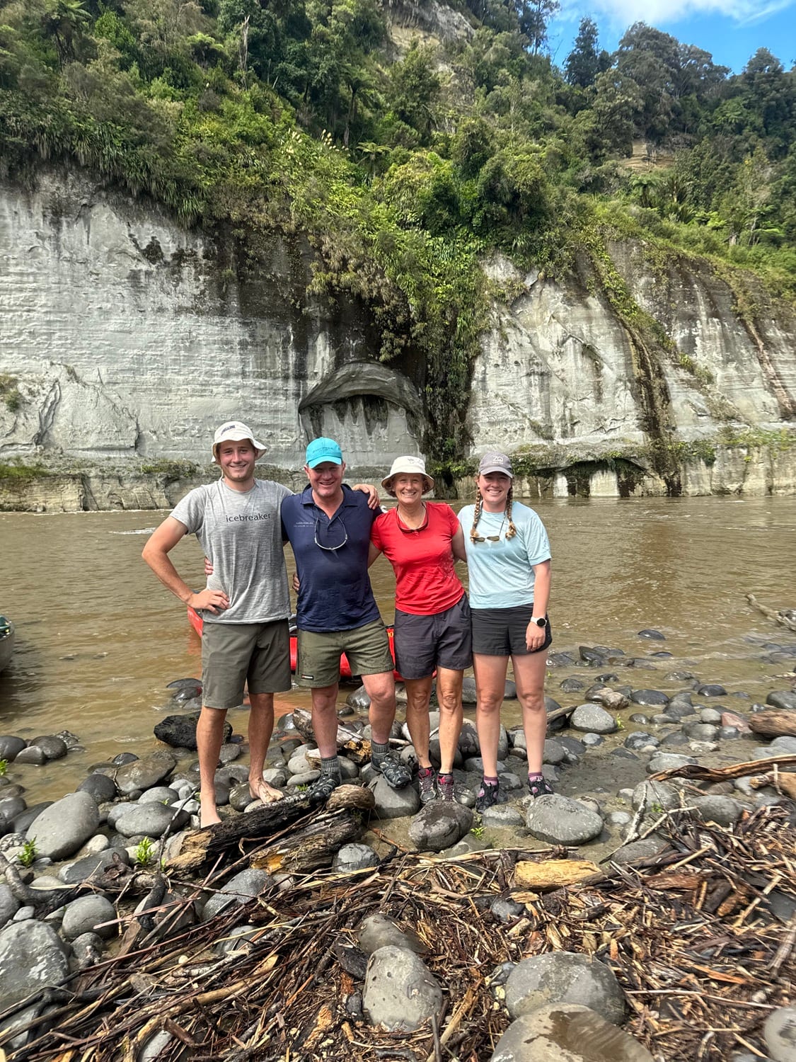The Subtil family together on a river bank