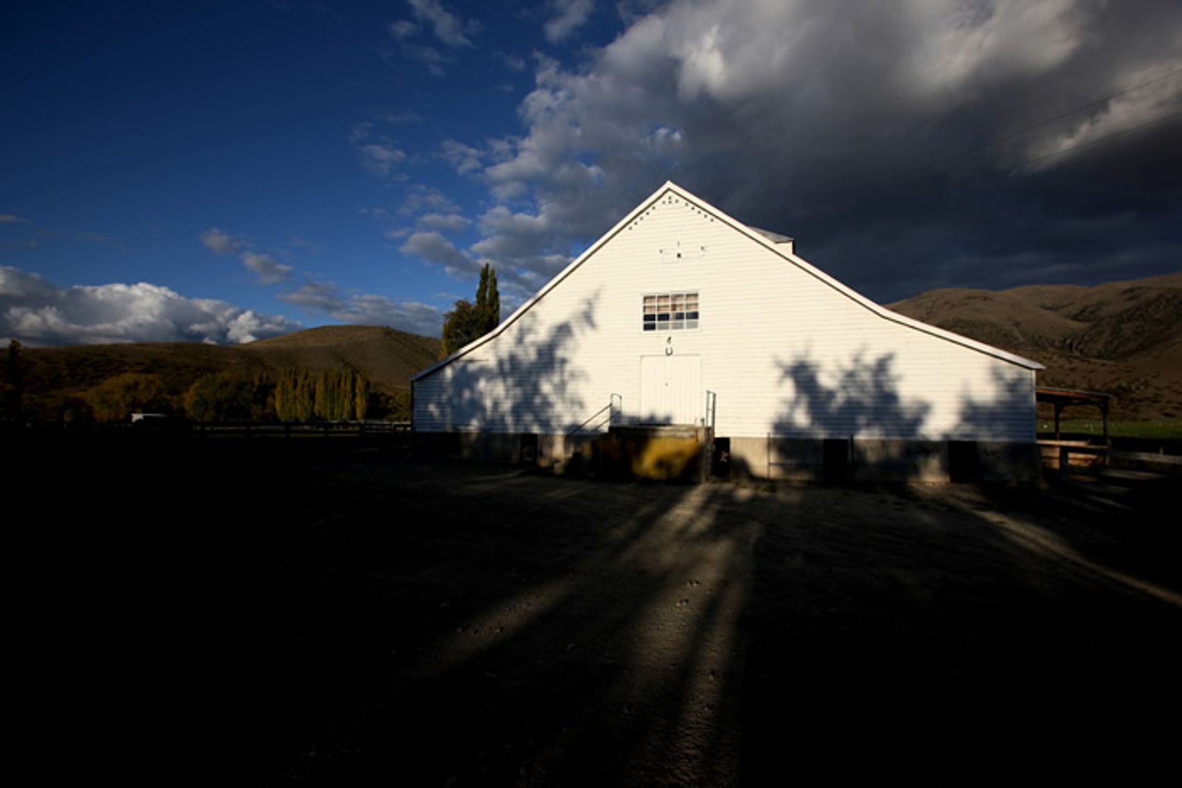 The historic woolshed in low afternoon light